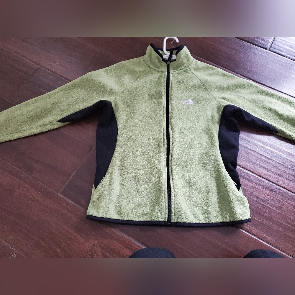 The North Face green and black zip up women's size xs. Very warm